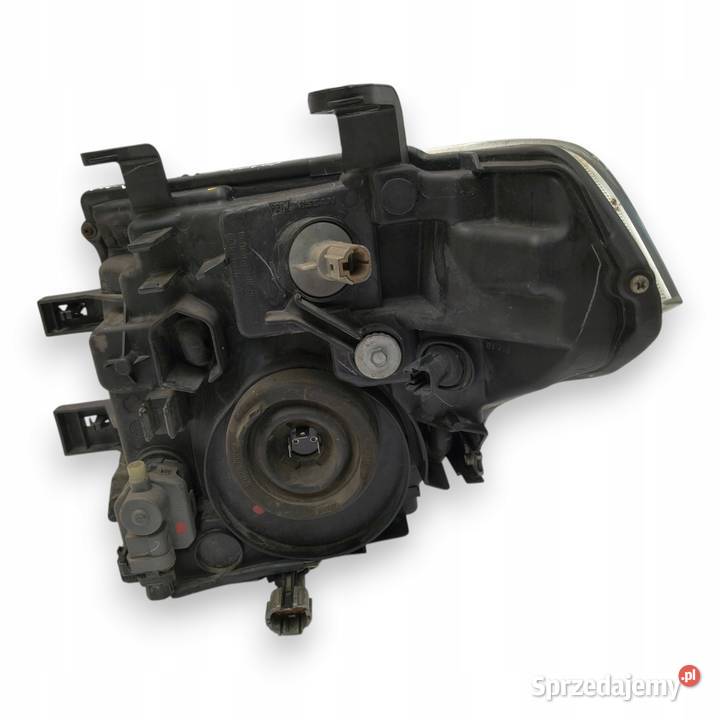 LAMPA PRAWA Nissan Navara D40 Pathfinder III R51 Lampy przednie
