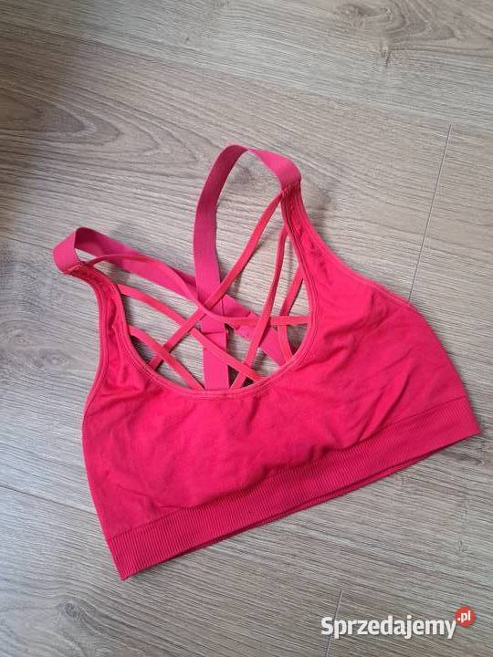 Czerwony sportowy top z ozdobnymi ramiączkami Trąbki Wielkie