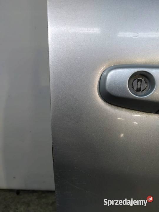 DRZWI PRAWE PRZÓD SREBRNE 1D4 Toyota RAV4 II