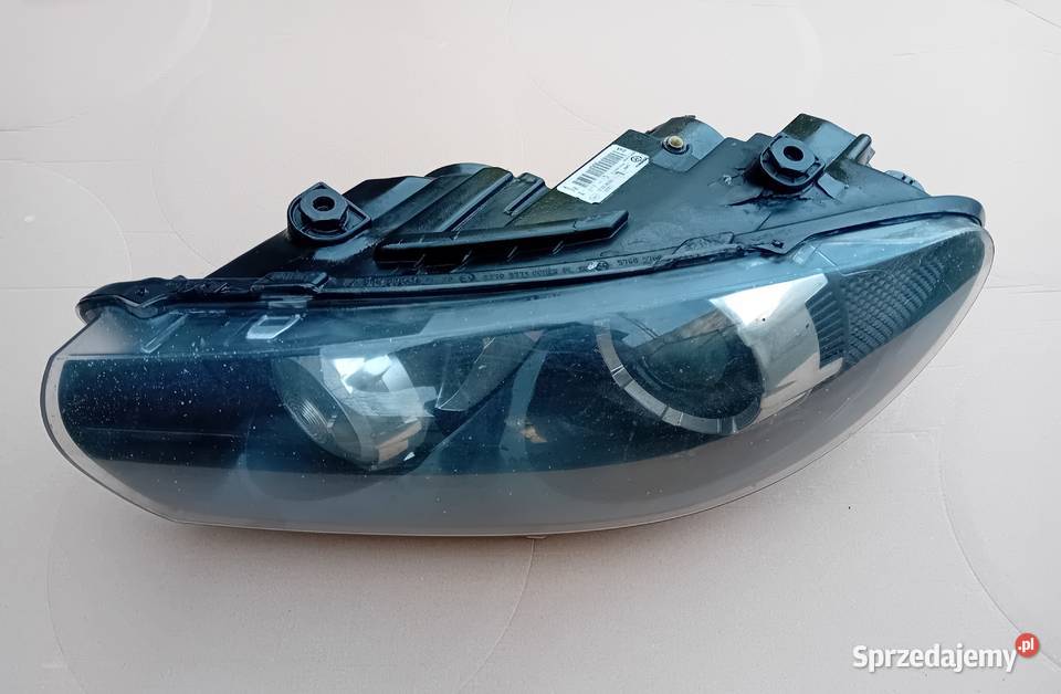 VW Sirocco Bixenon reflektor lampa lewy przód Przeźmierowo sprzedam