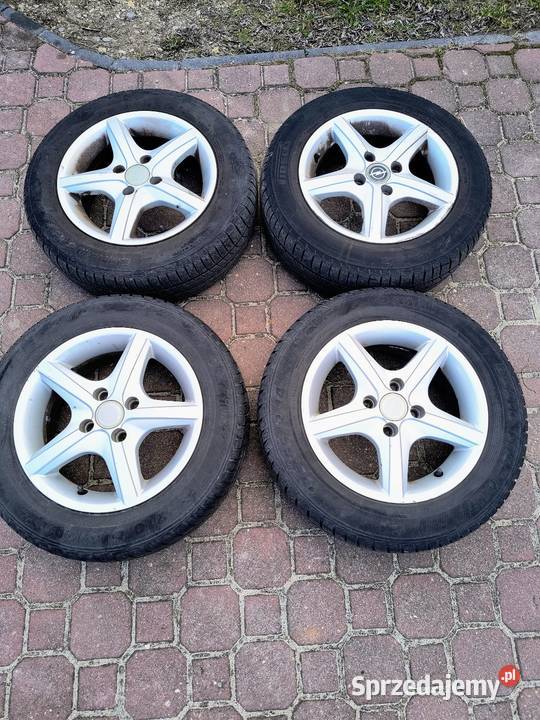 Felgi aluminiowe z oponami lato 14 Opel Corsa