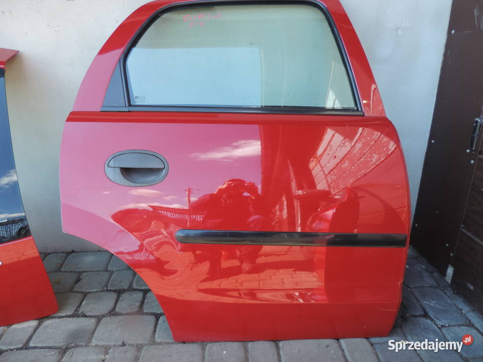 DRZWI PRAWY TYŁ OPEL CORSA C 5D Z573 Drzwi Nowy Sącz