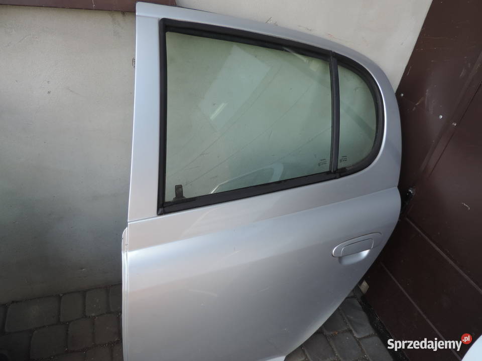 DRZWI TYLNE LEWE TOYOTA YARIS I HB FL 1E7 Nowy Sącz