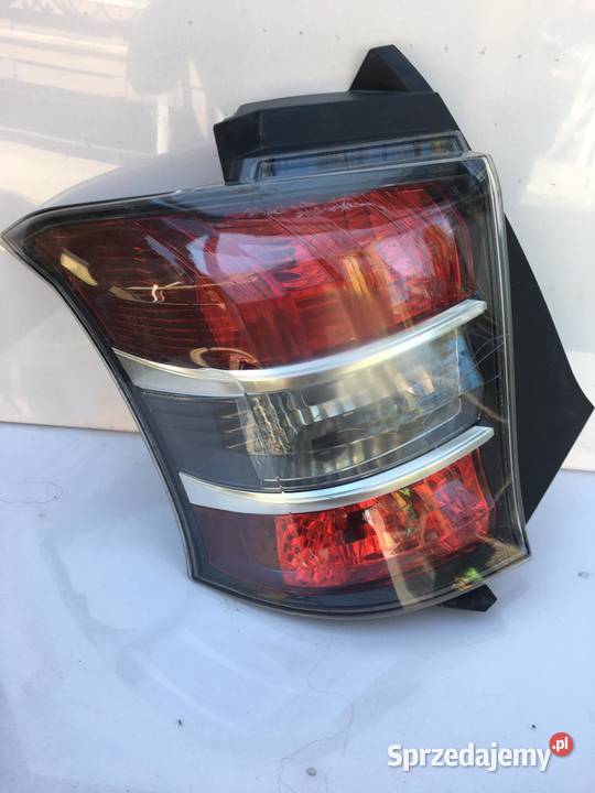 TOYOTA IQ LEWA LAMPA TYŁ Lampy tylne Ostroróg