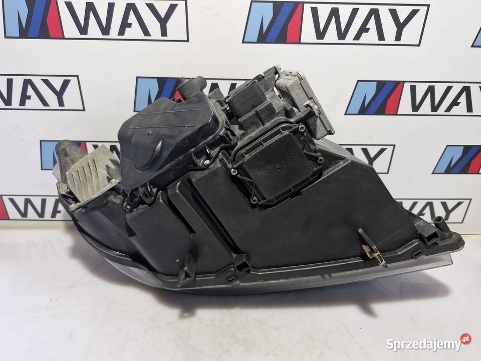 7202589 BMW E90 E91 LAMPA LEWA LEWY PRZÓD BI Lampy przednie