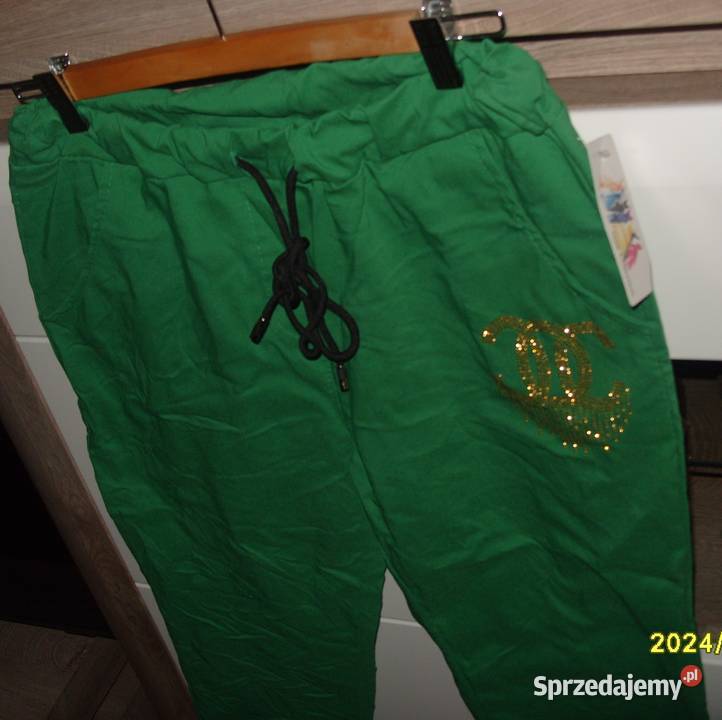NOWE zielone spodnie gnieciuch złote literki CC Spodnie Rawicz