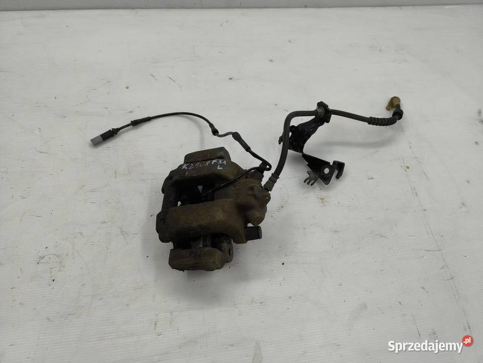 ZACISK LEWY PRZÓD BMW F31 20D LIFT