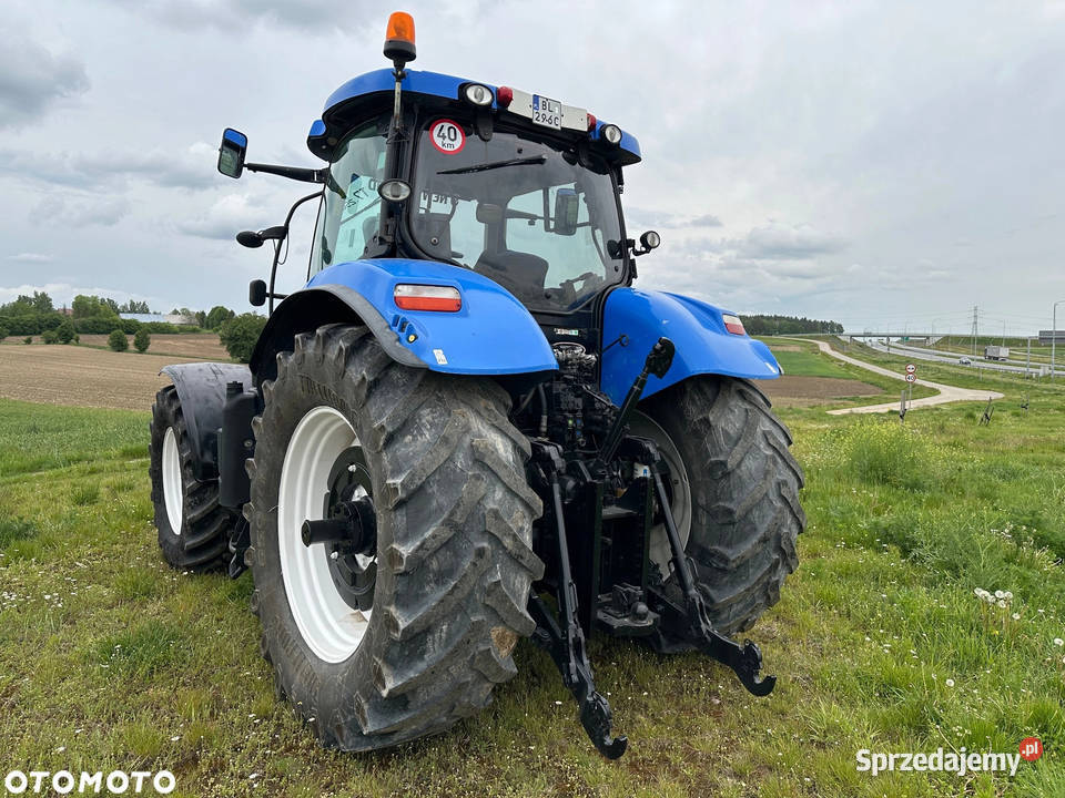 Holland T7250 Tuzwom przedni Zamiana