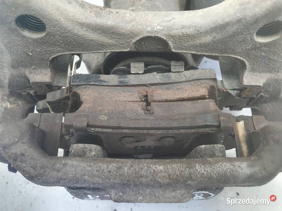 Toyota Corolla XII E21 TYLNY ZACISK HAMULCOWY Janów