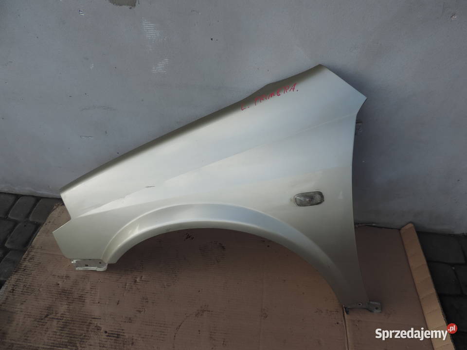 NISSAN PRIMERA P12 BŁOTNIK LEWY PRZEDNI EY2Z Nowy Sącz