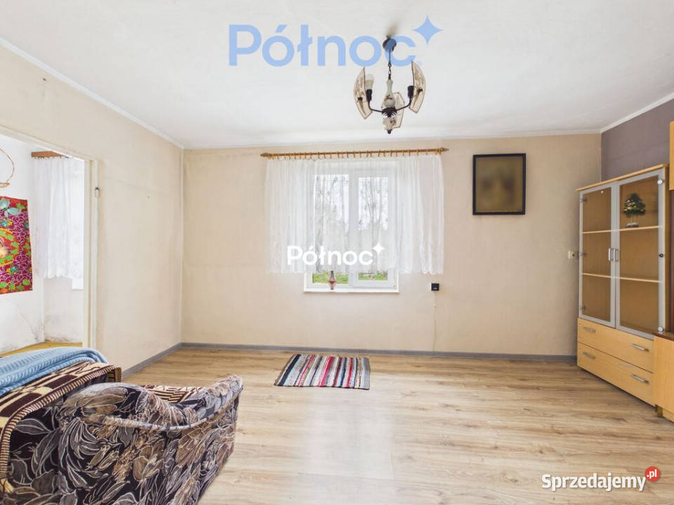 Stożne wiejski domek z drewutnią i ogrodem