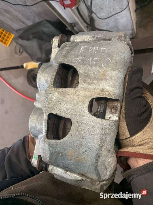 Zacisk hamulcowy przód lewy prawy 201018 ford Zaciski i jarzma Sierakowice
