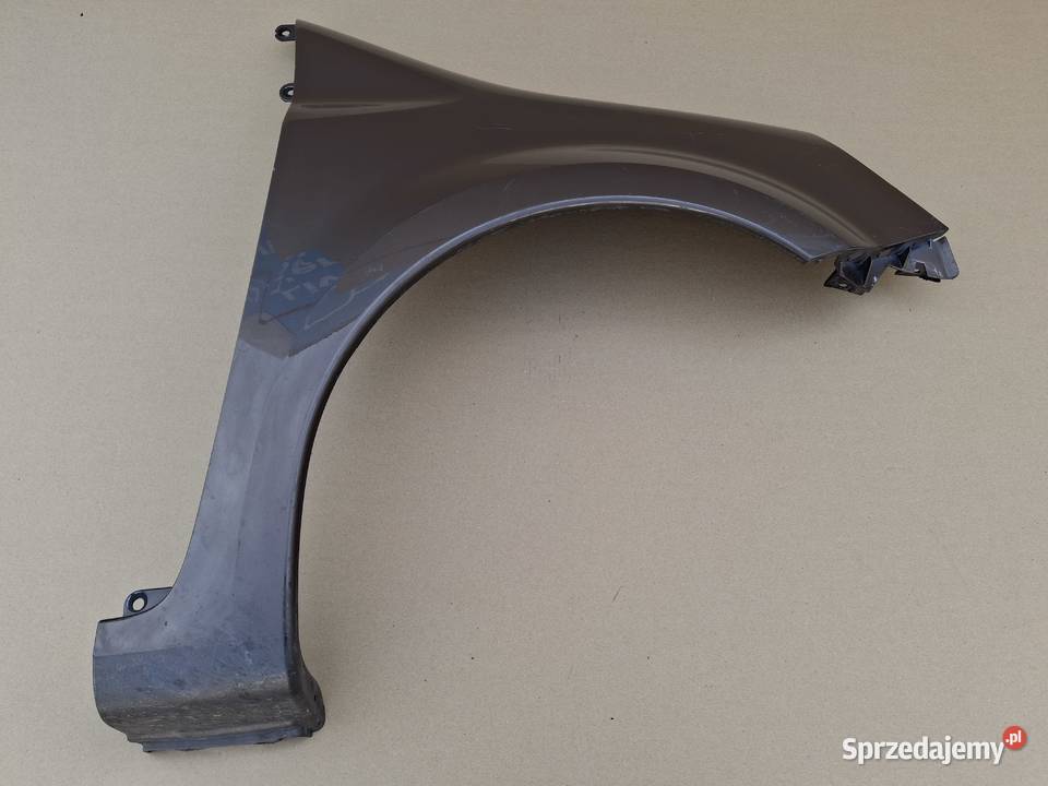 RENAULT MODUS BŁOTNIK PRAWY PRZÓD ORYGINAŁ