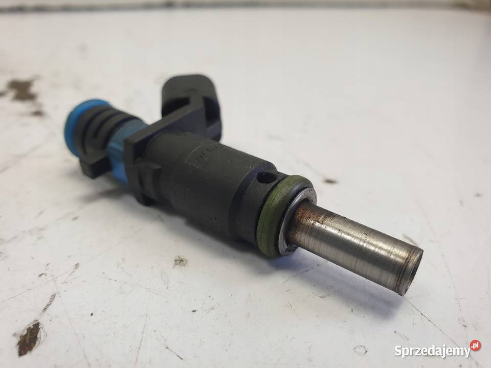 WTRYSKIWACZ Opel Zafira B 16 16V Z16XER 55562599 osobowe Wtryskiwacze Motoryzacja Chełm