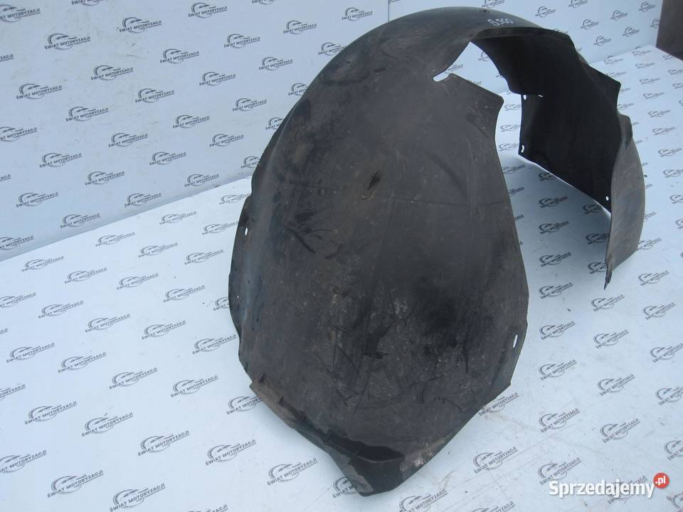 VW GOLF V 04r nadkole lewe przód 1K0805977B