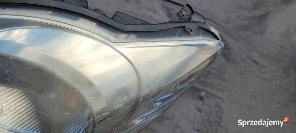 PEUGEOT 107 LEWY REFLEKTOR LAMPA LEWA PRZOD 1490 osobowe Ruda Śląska