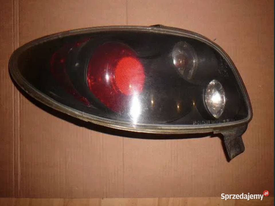 Lampa tył lewa Peugeot 206 Lexus Oświetlenie Ostrów Wielkopolski