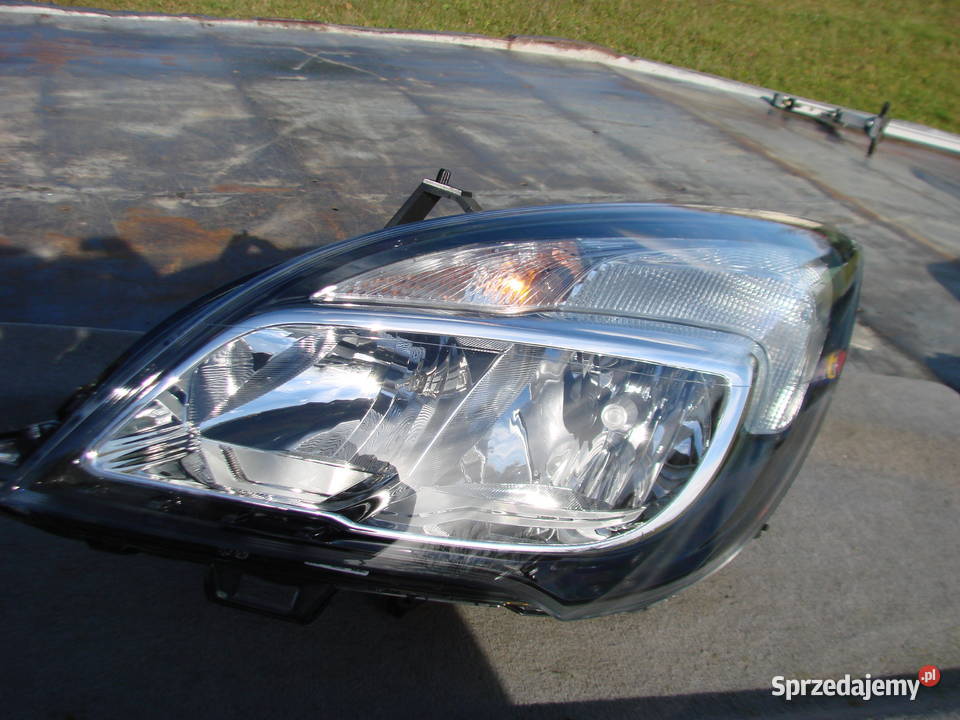 Opel Meriva B reflektor NOWY ORG KPL EU Mielec