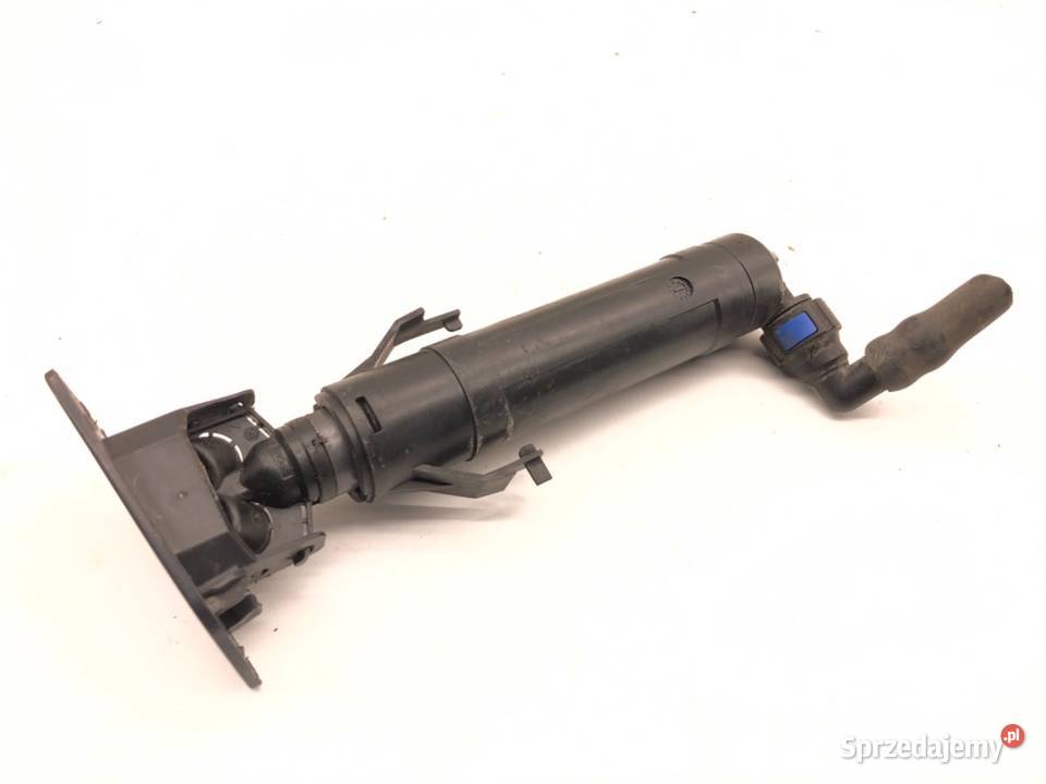 SPRYSKIWACZ REFLEKTORA PRAWY PRZÓD VW PASSAT B7