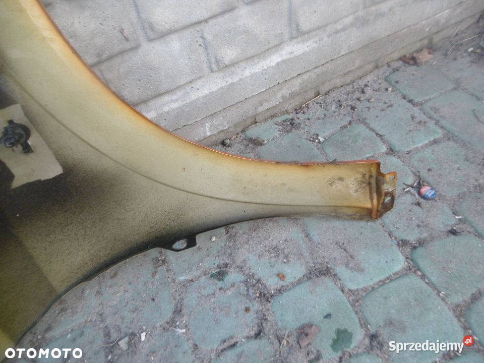 Błotnik lewy OPEL ASTRA II BEZ RDZY Radom