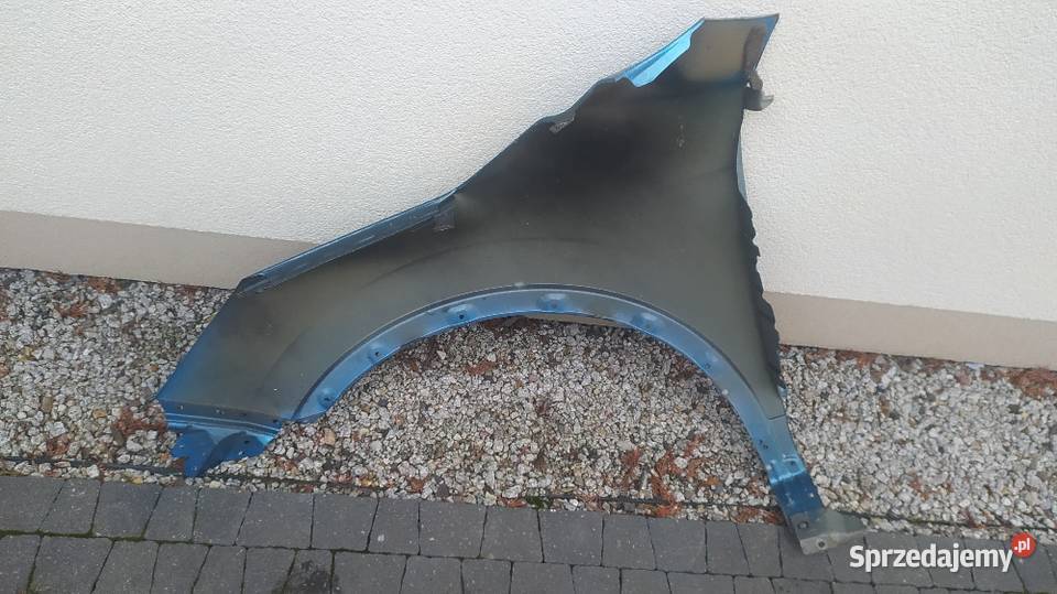 Błotnik przedni prawy Qashqai j11 lift Słupca