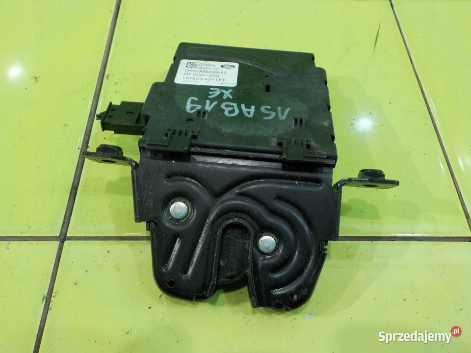 JAGUAR XE 20 D 16r SEDAN 4D zamek klapy tyl Zamki, wkładki i kluczyki