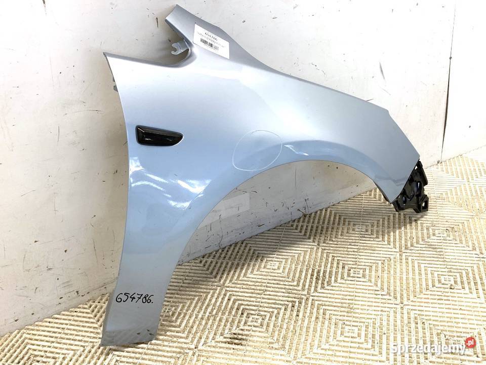 BŁOTNIK PRAWY PRZÓD OPEL ASTRA J SedanLimuzyna