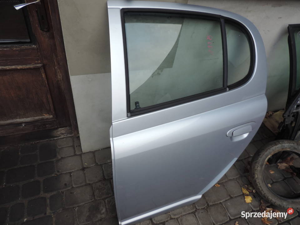 DRZWI LEWY TYŁ TOYOTA YARIS 1 KOLOR 199 Nowy Sącz