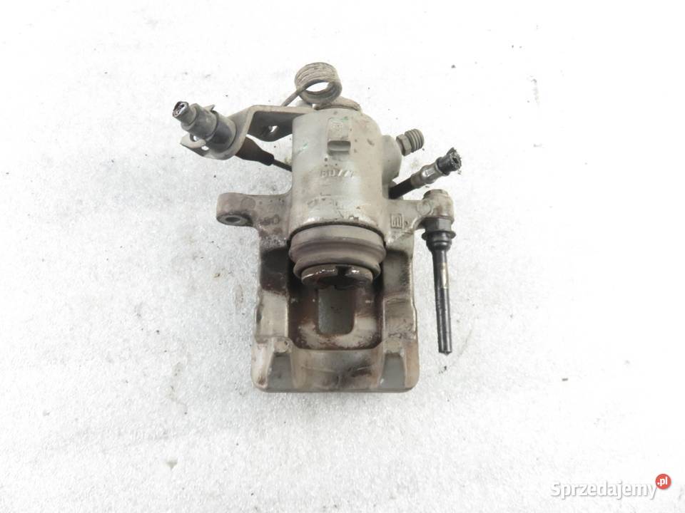 ZACISK LEWY TYŁ AUDI TT 18 T