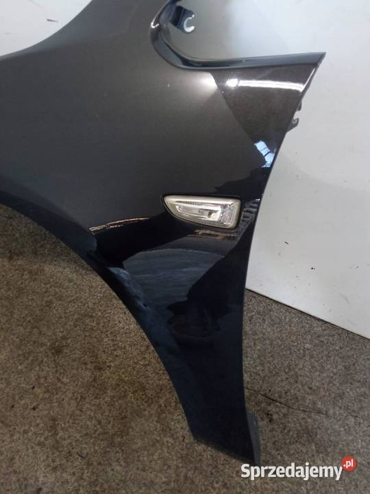 BŁOTNIK LEWY PRZÓD LIFT Z190 Opel Astra IV 2009