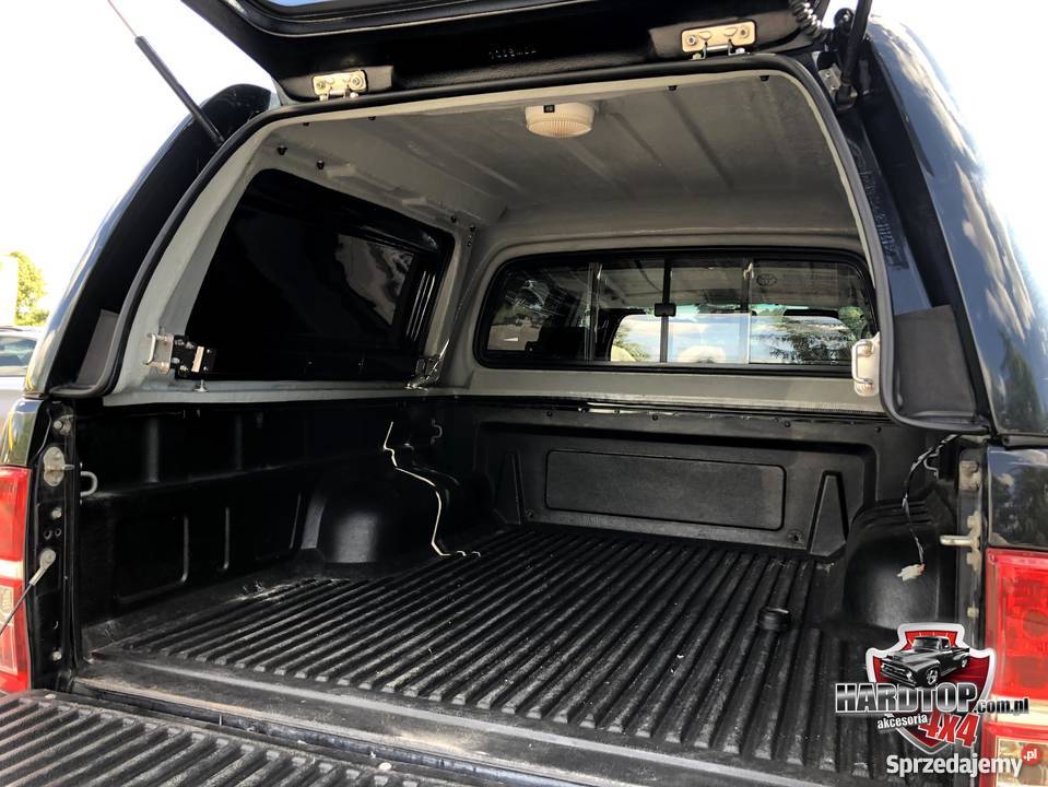 Zabudowa Toyota Hilux 0515 otwierane klapy z Pasłęk