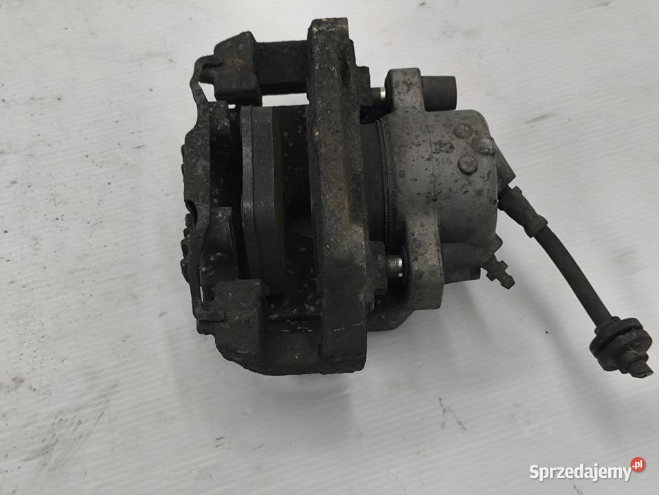 ZACISK LEWY PRZÓD BMW E90 osobowe