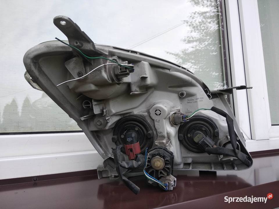 Toyota Corolla Verso I lampa przednia lewa Sieradz