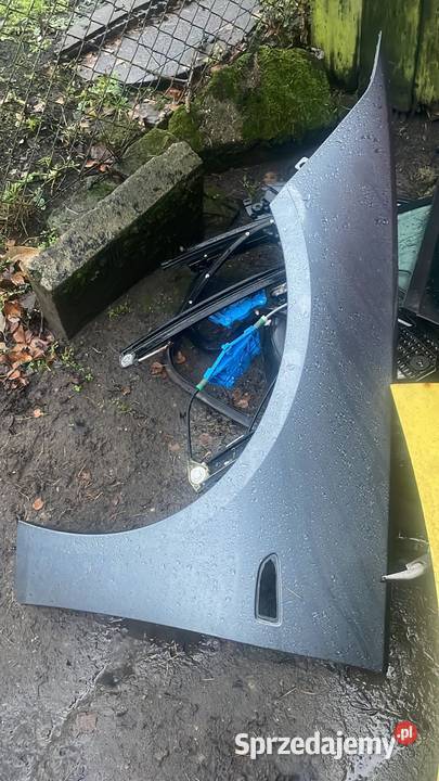 Błotnik lewy OPEL INSIGNIA B szary Margonin