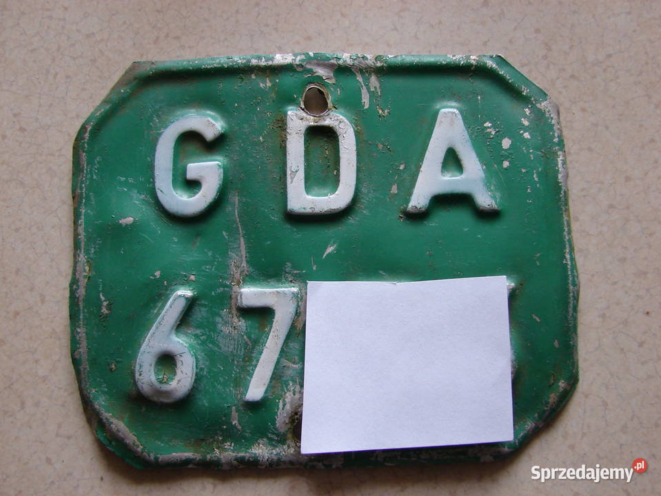 Stara kolekcjonerska tablica rejestracyjna Komar Części i akcesoria motocyklowe Starogard Gdański