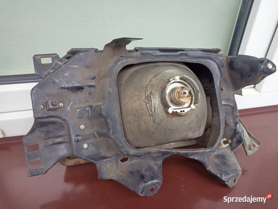 Nissan Sunny B11 lampa przednia prawa reflektor Oświetlenie Sieradz