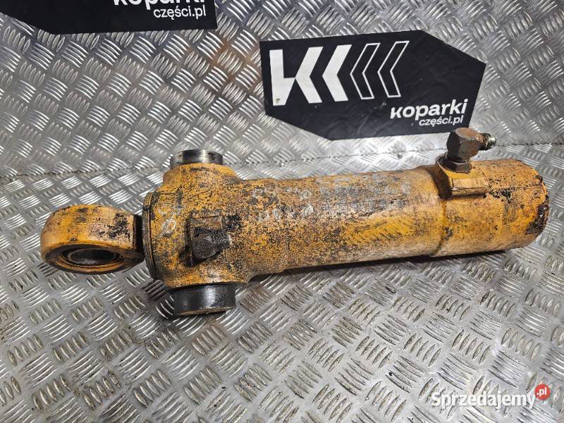 Siłownik hydrauliczny obrotu tylnego ramienia Układ hydrauliczny