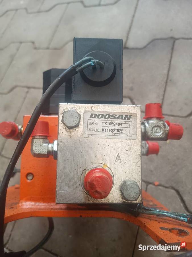 Zawór blokujący cewka Doosan K1052404 K11F23025 Staszów