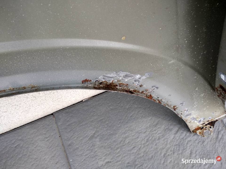 Opel Astra H błotnik przedni lewy srebrny Z157 Błotniki Sieradz