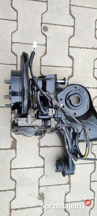 MAZDA 2 TOYOTA YARIS IV BELKA ZAWIESZENIE TYŁ 15
