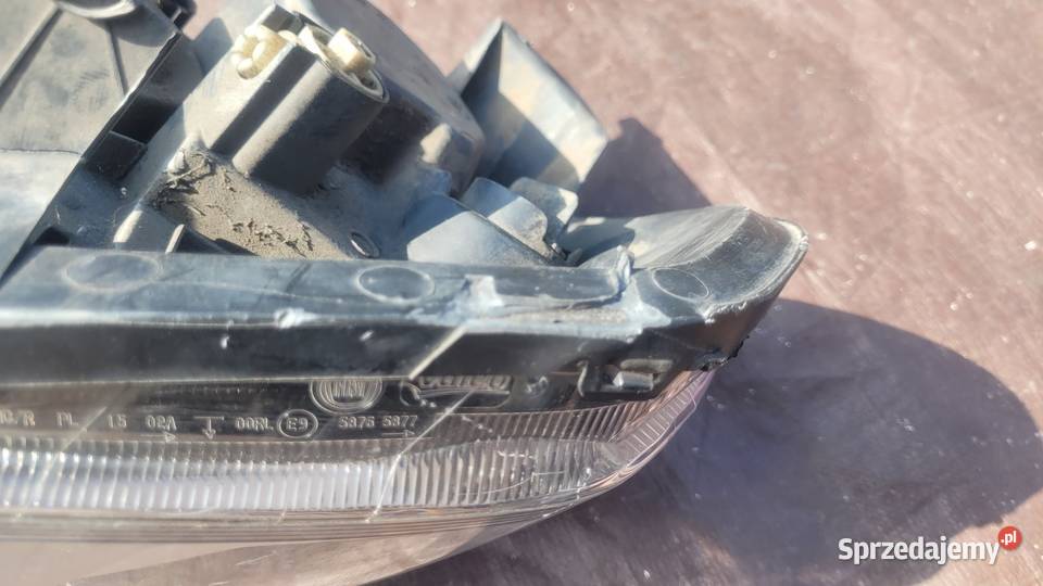 FIAT GRANDE PUNTO EVO 09 LAMPA LEWA PRZÓD osobowe Lampy przednie Ruda Śląska