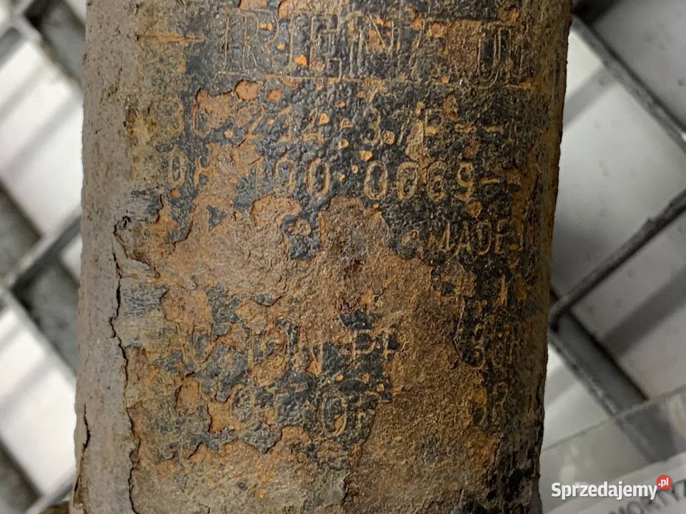 AMORTYZATOR LEWY PRZÓD ZE SPRĘŻYNĄ RENAULT