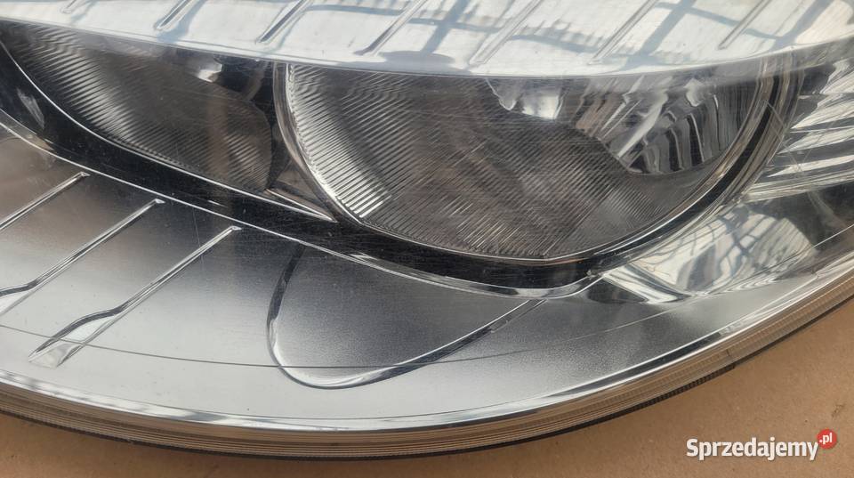 RENAULT FLUENCE LEWY REFLEKTOR LAMPA LEWA PRZOD Ruda Śląska