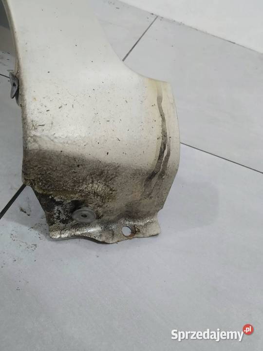 BŁOTNIK LEWY PRZÓD LIFT 5A7 Toyota Yaris II sprzedam