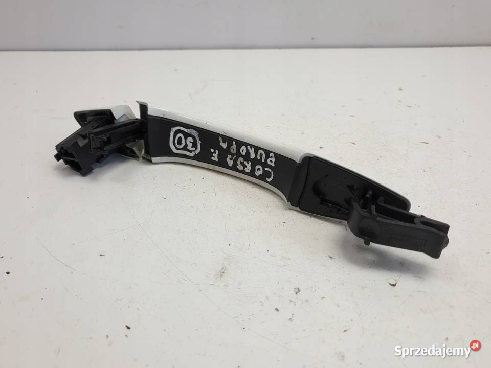 Opel Corsa F LEWA KLAMKA ZEWNĘTRZNA Lewy tył Klamki Rudka