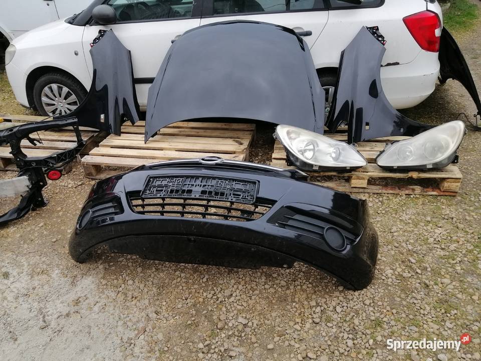 Opel Corsa D błotniki maska zderzak kod lakieru osobowe Błotniki