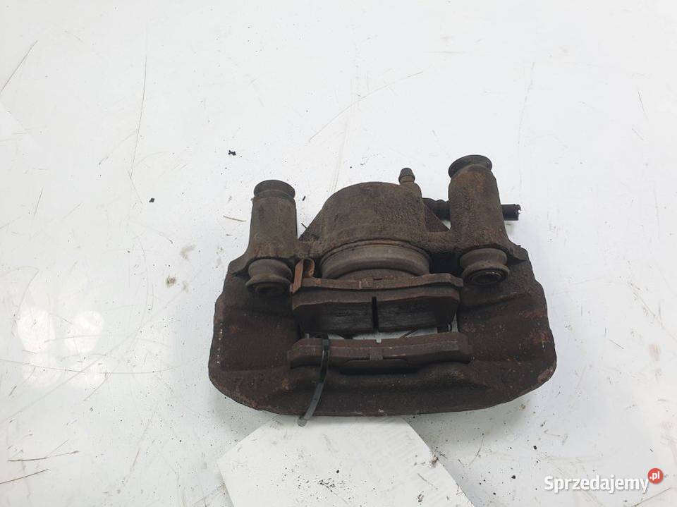 ZACISK HAMULCOWY PRZÓD PRAWY MAZDA 323F sprzedam