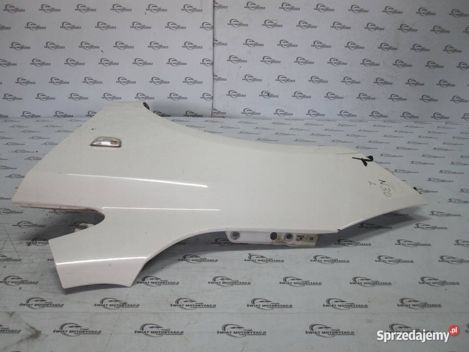 OPEL CORSA E 17r błotnik lewy przód
