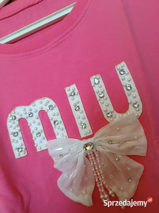 Bluza różowa z ozdobną kokardą i perełkami Cieszyn