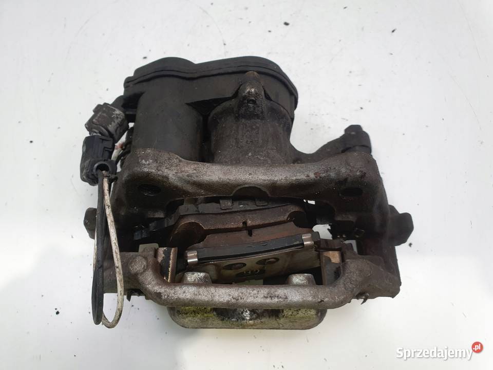 Toyota Corolla XII E21 TYLNY ZACISK HAMULCOWY osobowe Rudka